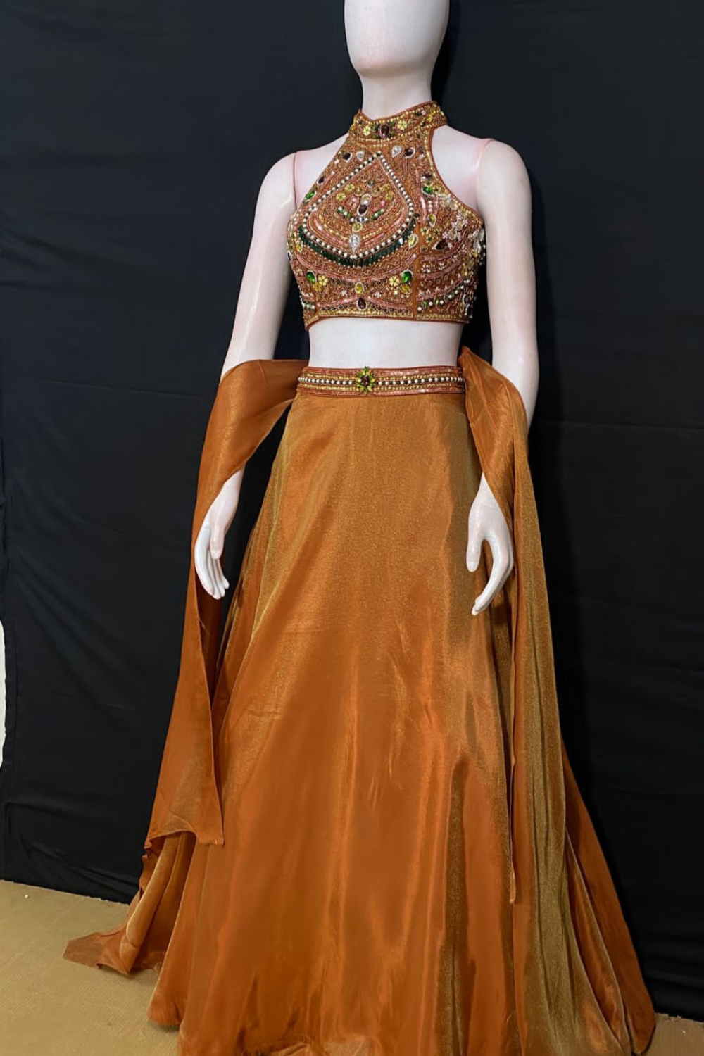 Rust- Orange Jewelry Work Halter Neck Lehenga